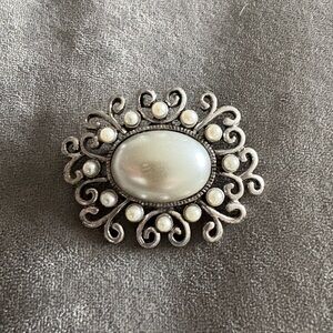 Elegant Silver and Pearl Brooch